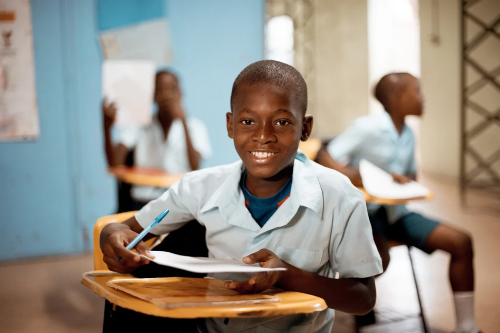 shallow focus shot african child learning at school